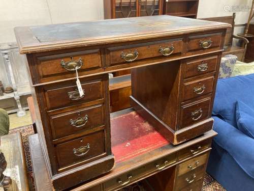 A late Victorian walnut kneehole desk, length 106cm, depth 6...