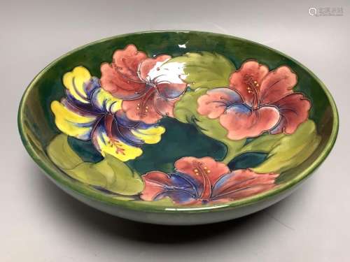 A green Moorcroft hibiscus bowl, diameter 26cm