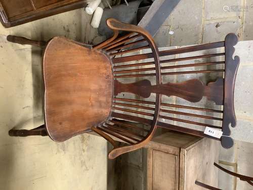 A Victorian fruitwood, ash and elm splat-back Windsor armcha...