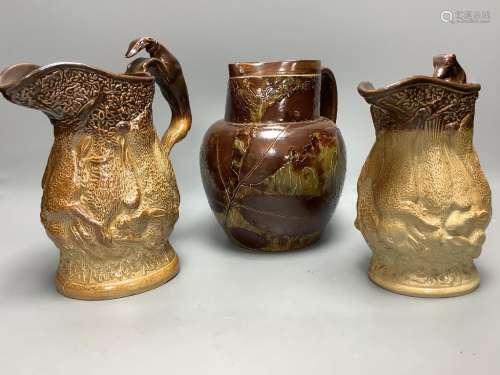 Two 19th century hunting related stoneware jugs and a Doulto...