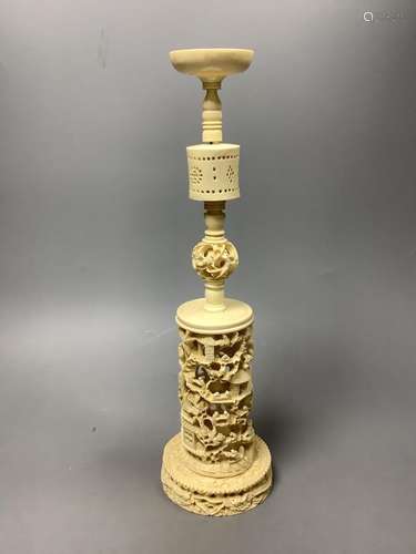 A Chinese ivory puzzle ball stand, late 19th century, 36cm