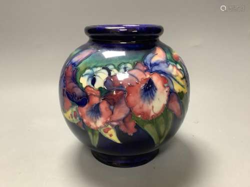 A Moorcroft blue ground bulbous Orchid pattern vase,blue sig...