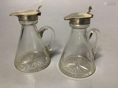 A pair of George V silver mounted glass whisky tot jugs, S. ...