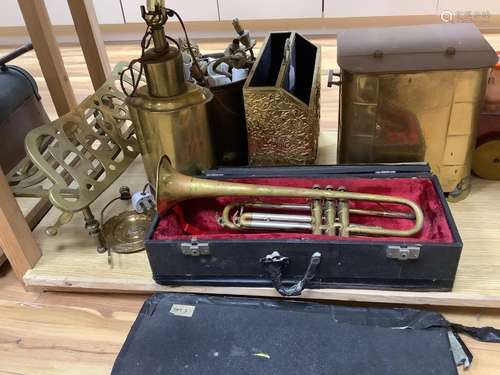 A quantity of mixed brass including a coal scuttle, trivets,...