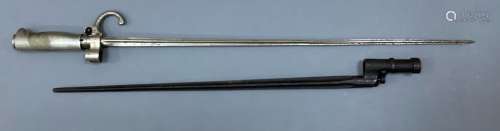 A Lebel 1886 model bayonet and a Mosin Nagant 1891 model bay...
