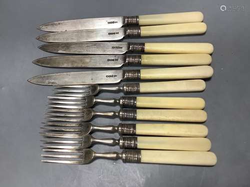 Five pairs of George V ivory handled silver dessert eaters a...