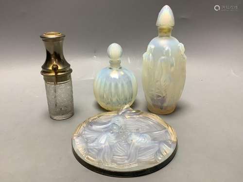 A collection of Sabino and other glass scent bottles and a p...