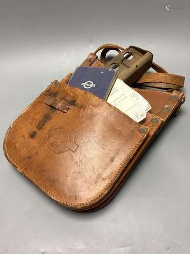 A 1950's London Transport bus conductor's satchel, ticket ho...