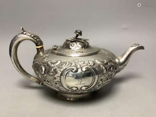 A Victorian embossed silver squat melon shaped teapot, Walte...