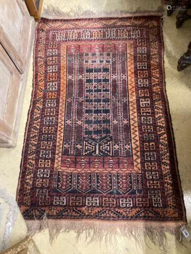 A Belouch red rug, 135 x 87cm