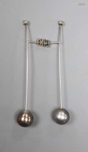 A pair of white metal, cultured Tahitian pearl and diamond s...