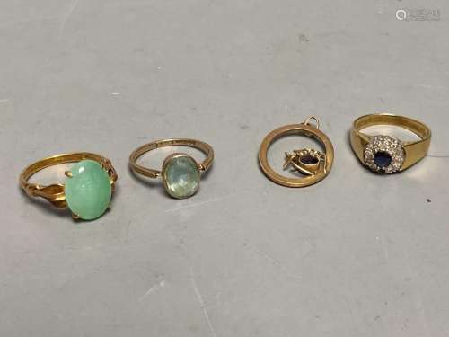 A yellow metal (stamped 14k) and green cabochon set ring, si...
