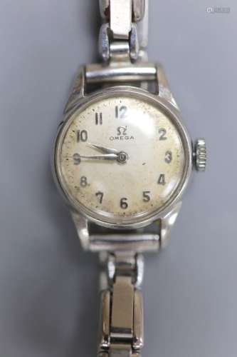 A lady's stainless steel Omega manual wind wrist watch, on a...
