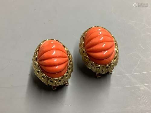 A pair of carved coral oval earrings,yellow metal setting, 2...