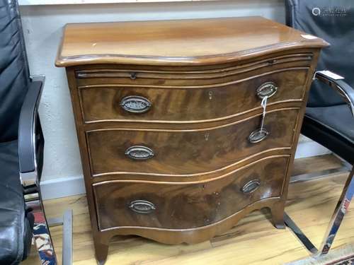 A George III design mahogany serpentine chest, brushing slid...