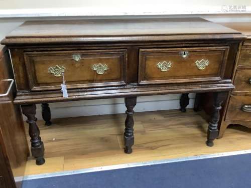 A small 18th century oak two drawer low dresser, width 124cm...