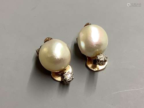A pair of yellow metal, baroque pearl and diamond set ear cl...