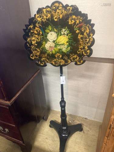 A Victorian ebonised pole screen with papier mache banner, h...