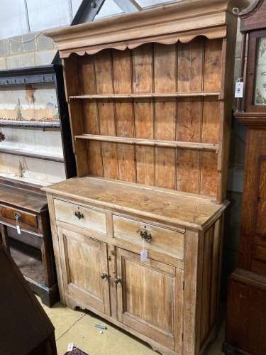 A Victorian pale pine kitchen dresser, length 124cm, depth 4...
