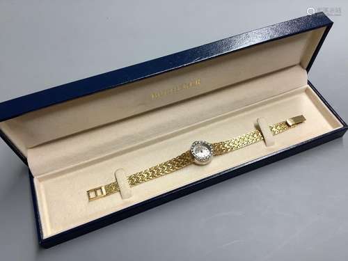 A lady's modern yellow metal (stamped 750) and diamond set B...