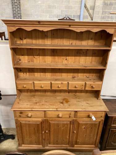 A Victorian style pine dresser, length 140cm, depth 44cm, he...