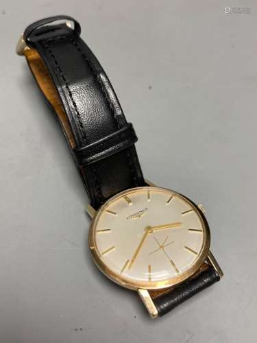 A gentleman's 1960's 9ct gold Longines manual wind wrist wat...