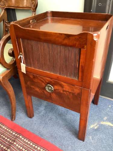 A Georgian mahogany tray-top commode, having tambour shutter...
