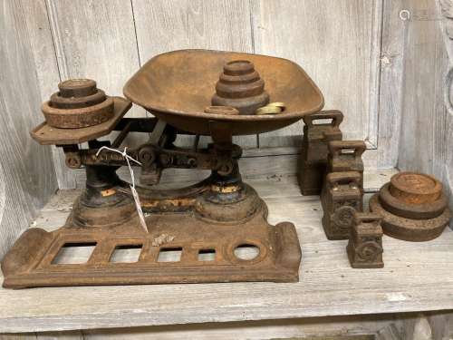 A set of Avery scales, width 40cm and weights, together with...