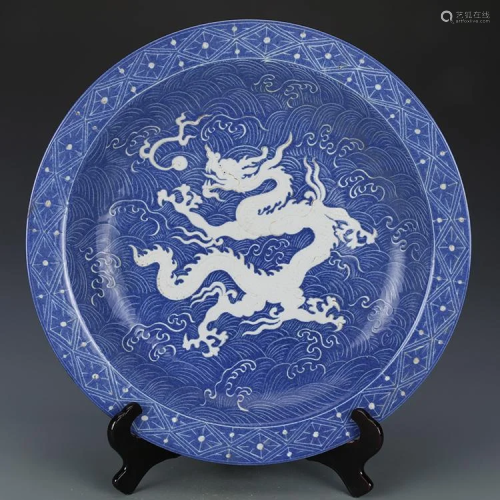 Yuan dynasty blue glaze plate with white dragon