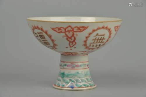 Iron red glaze famille rose goblet outlined in gold