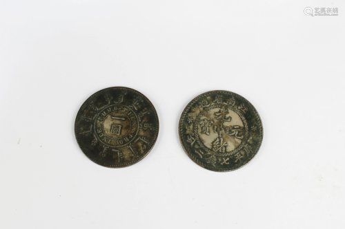 A Group of Two Silver Coins
