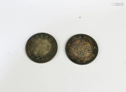 A Group of Two Silver Coins