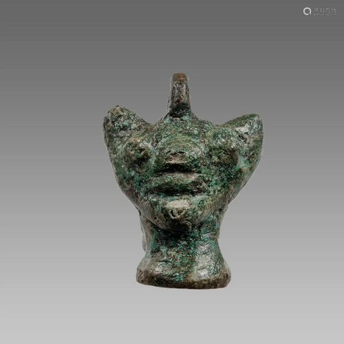 Ancient Bronze head of Pazuzu amulet.