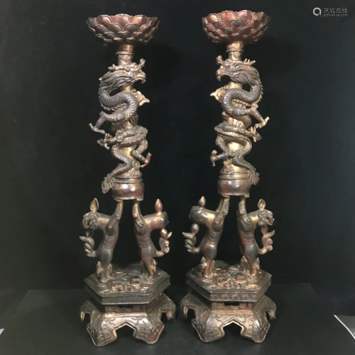 A collection of pure copper Panlong candlesticks. It is