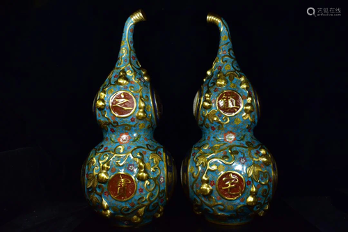 A pair of cloisonne gossip gourds with brass tires,