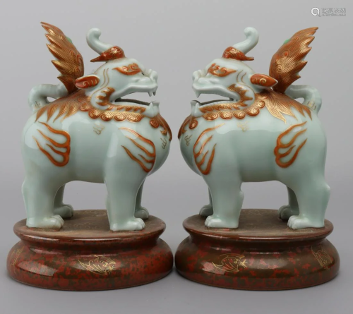A pair of green-glazed alum and red gold-painted