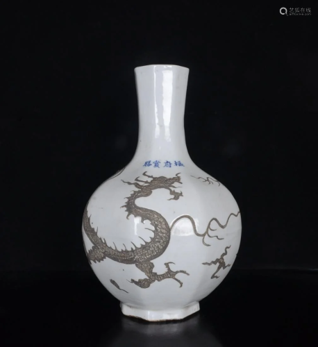 Yuan egg white glaze carved dragon pattern Shufu