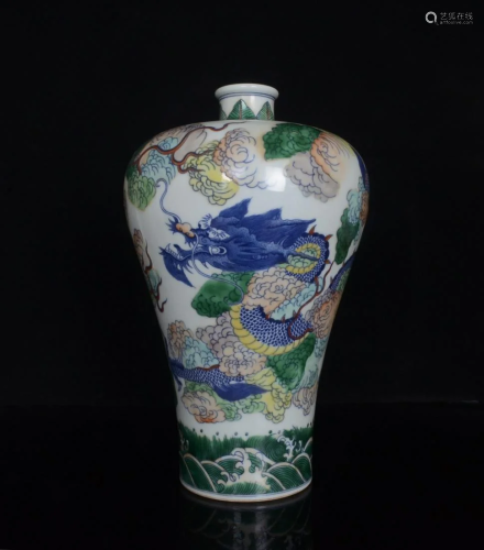 A plum vase with a cloud and dragon pattern in the