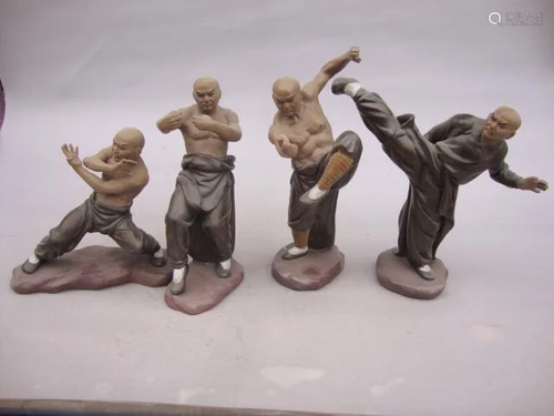 Antiques. Antique porcelain sculptures. Shaolin Temple