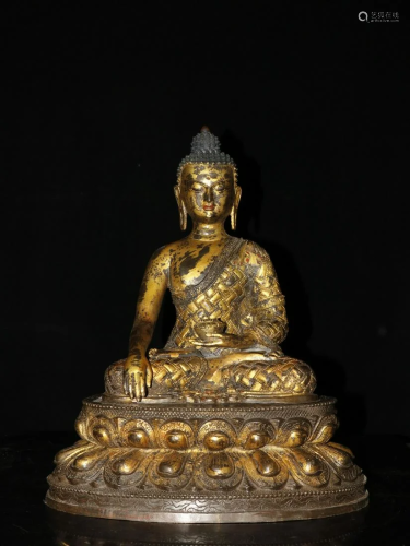 The old gilt bronze Buddha statue of Sakyamuni