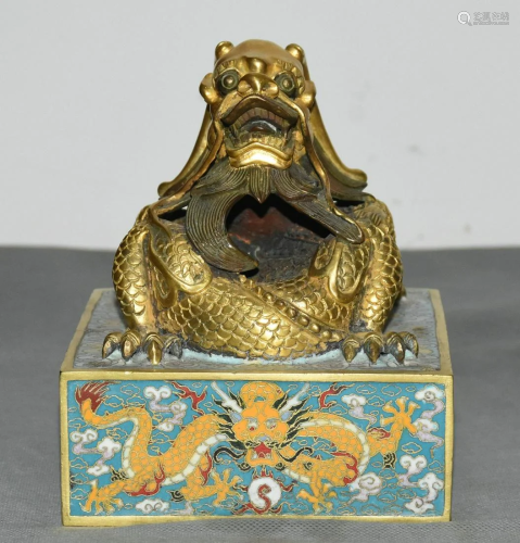 A real gold cloisonnÃ© dynasty dragon medal from the