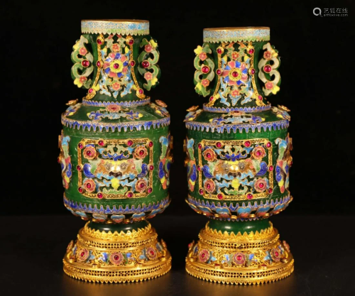 A pair of gilt silver inlaid jadeite vases from the