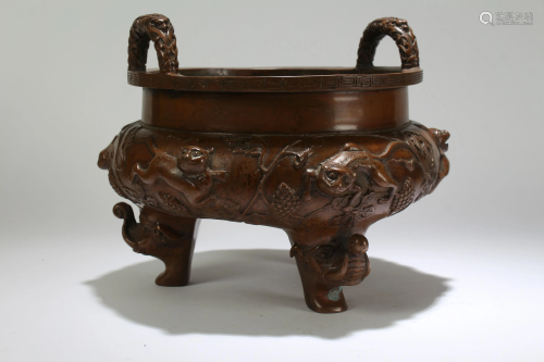 A Chinese Tri-podded Dragon-decorating Censer