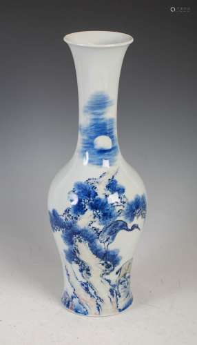 A Chinese porcelain blue, white and copper red bottle vase, ...