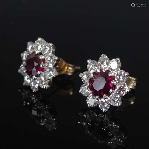 A pair of white and yellow metal ruby and diamond cluster ea...