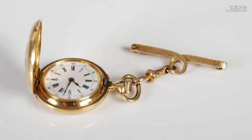 A Lady's 18ct gold half hunter fob watch, the outer case wit...