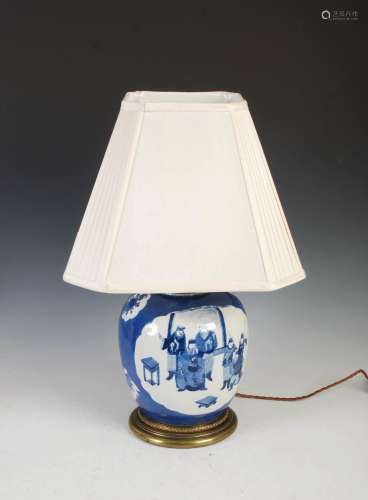 A Chinese porcelain blue and white jar later converted to a ...