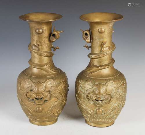 A Pair of Chinese bronze bottle vases, Qing Dynasty, decorat...