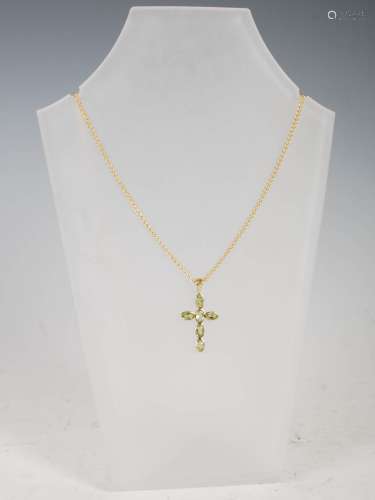 STUART GELNER, A 9ct yellow gold cross pendant, set with six...