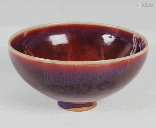 A Chinese porcelain sang-de-boeuf glazed footed bowl, Qing D...